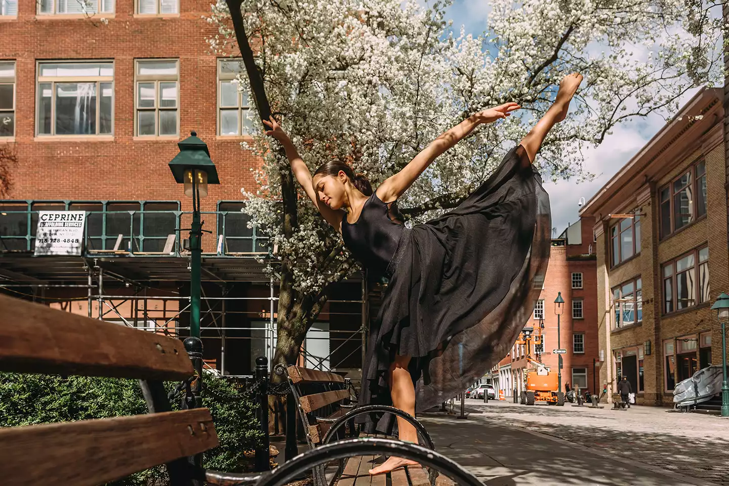 A DDF beautiful dancer showing her stunning arabesque on a Spring Day at the Seaport!