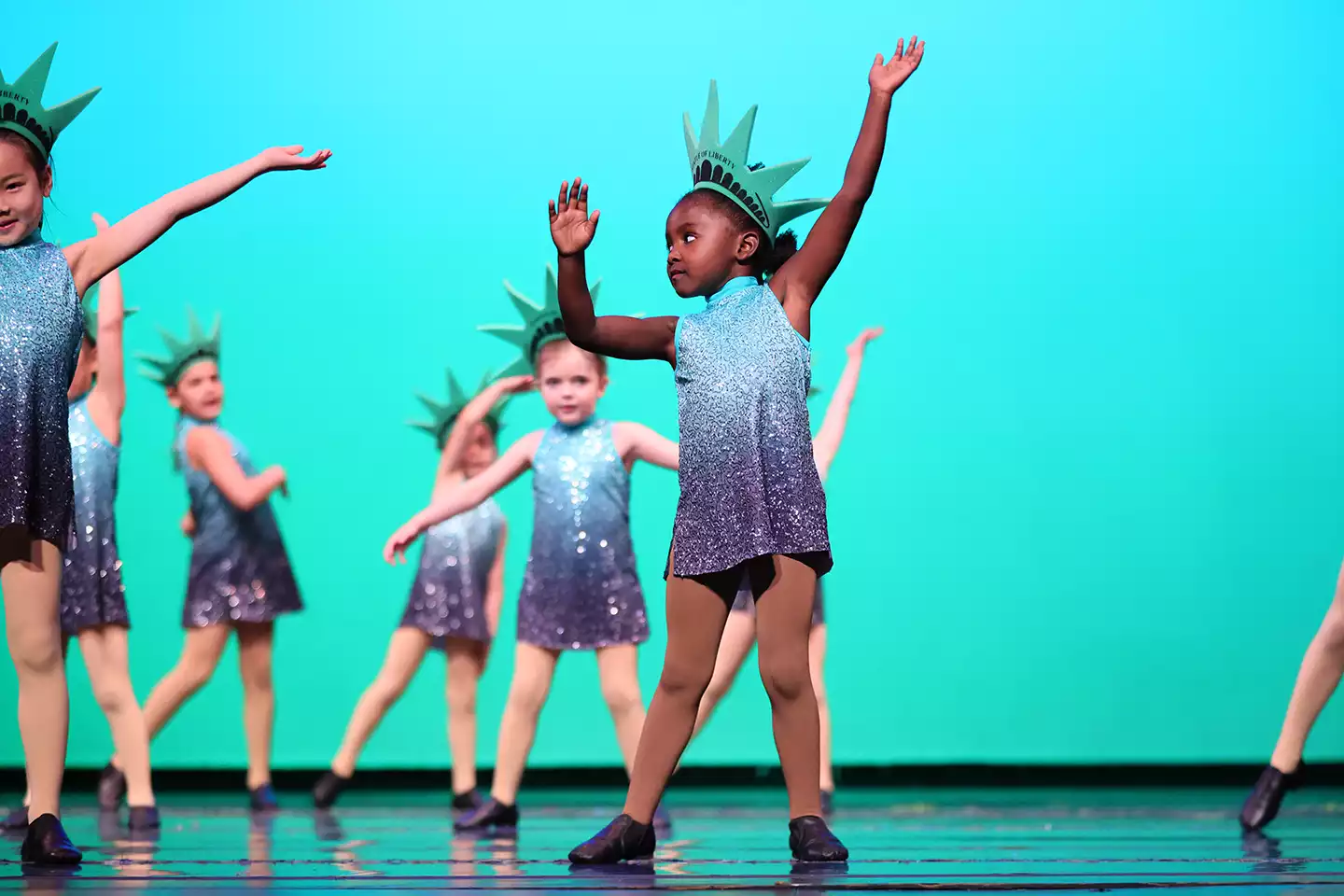 Enjoy a few highlights from our “Strike a Pose” recital season – May 2023.